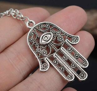 amulet is the hand of luck